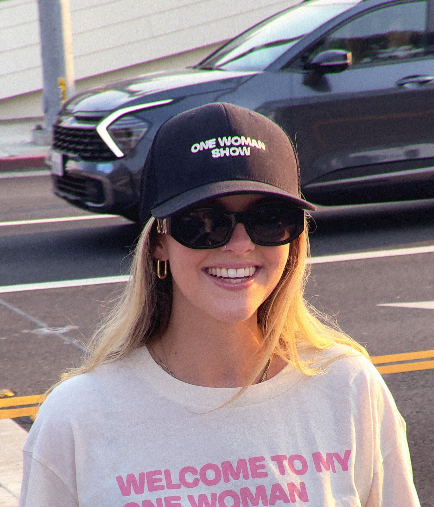 One Woman Show Trucker Hat